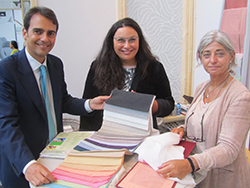 Eduardo Aznar, Principado, Aznar, showing off his first Eco Green collection of recycled cotton fabrics with Cristina Sanjuan, Aznar Export Manager for Germany and Ana Rios, Export Director for Aznar