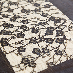 Hand cut Japanese stencils made from layered Mulberry bark paper, using human hair between layers for reinforcement when printing kimonos or other textiles. 